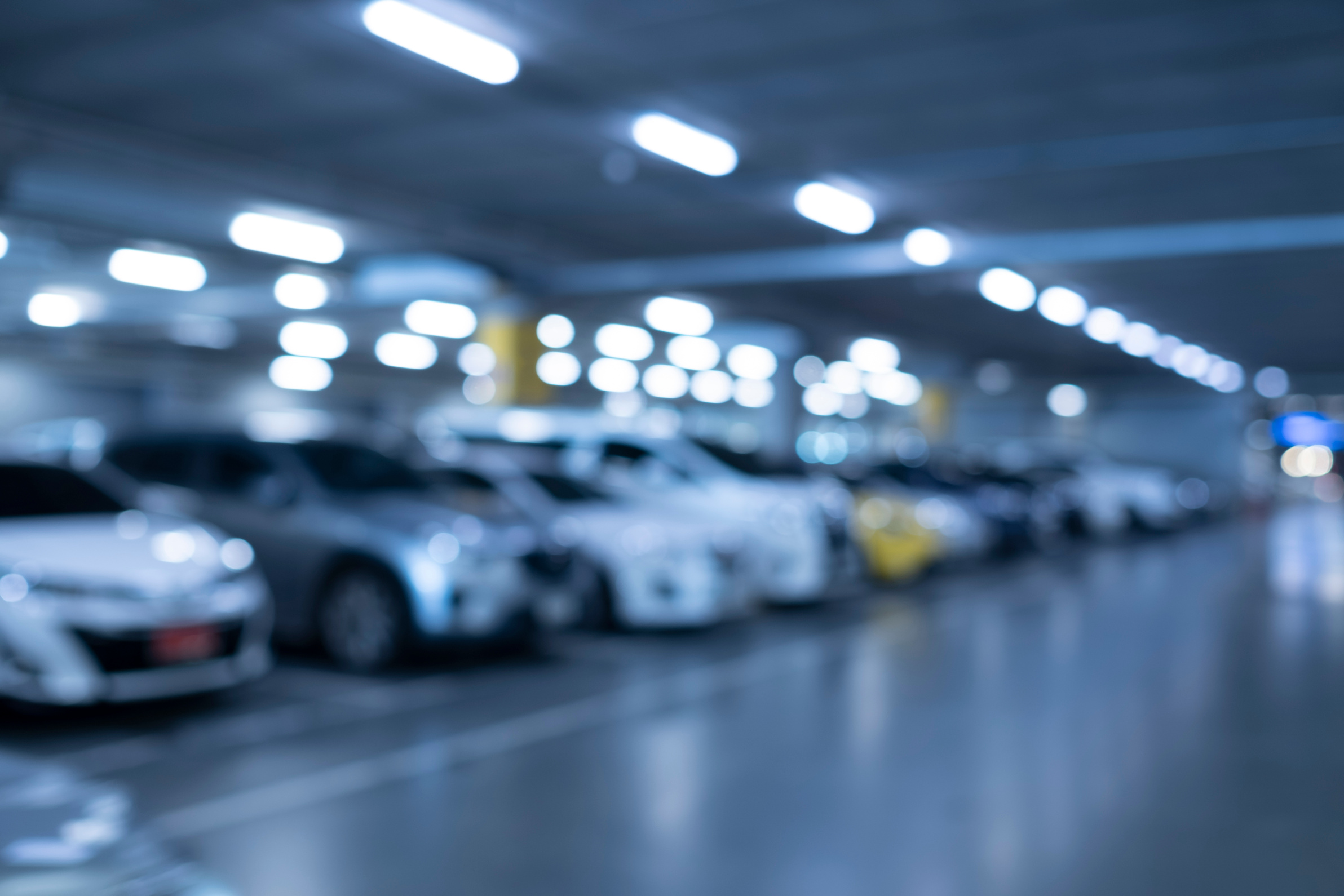 Blurred car Parking with cars in shopping mall